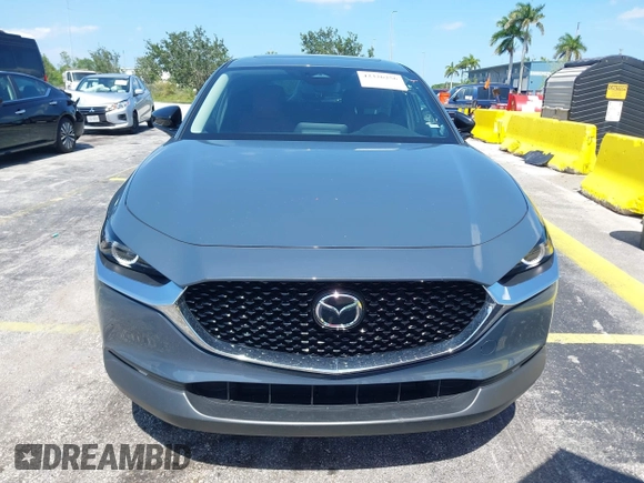 2024 Mazda CX-30 S Carbon Edition z VIN 3MVDMBCM0RM661018, wystawiony jako IAAI lot #42326256 z przebiegiem 22 169 mil mil oraz . Historia ofert i sprzedaży dostępna na DreamBid. Obrazek 12.