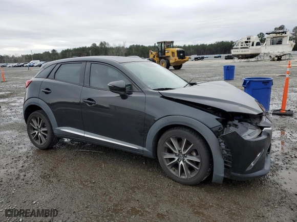 2017 Mazda CX-3 Grand Touring with VIN JM1DKFD76H0155511, listed as a Copart auction lot 48402965 with 107,027 mi miles and Salvage Title. Bid and sale history available at carsss.com. Image 4.