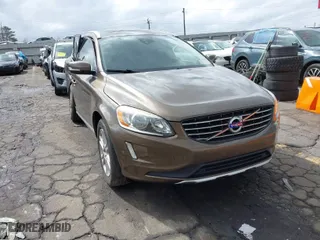 2015 Volvo XC60 T5 Drive-E Premier with VIN YV440MDK8F2681703, listed as a IAAI auction lot 41730228 with 112,738 mi miles. Bid and sale history available at carsss.com. Image 1.