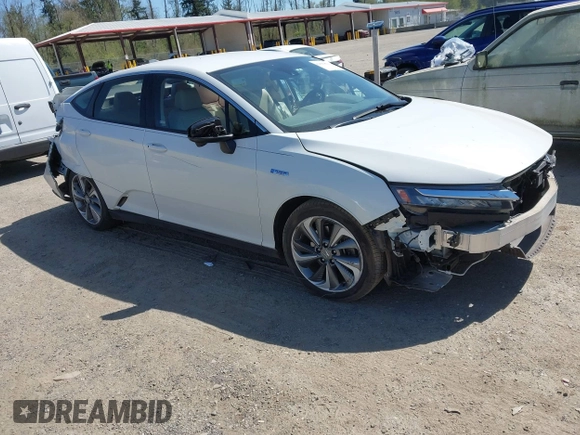 2019 Honda Clarity with VIN JHMZC5F1XKC007033, listed as a IAAI auction lot 42064611 with 28,458 mi miles. Bid and sale history available at carsss.com. Image 1.