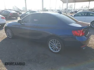 2015 BMW 2 Series 228i xDrive with VIN WBA1F7C5XFV367287, listed as a IAAI auction lot 40802463 with 113,427 mi miles and . Bid and sale history available at carsss.com. Image 3.