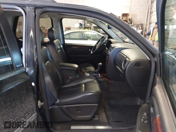 2007 GMC Envoy SLE with VIN 1GKDT13S472123167, listed as a IAAI auction lot 41385620 with 157,680 mi miles. Bid and sale history available at carsss.com. Image 5.
