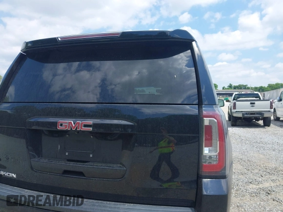 2015 GMC Yukon SLT with VIN 1GKS2BKC5FR275085, listed as a IAAI auction lot 42025693 with Not Provided miles. Bid and sale history available at carsss.com. Image 16.