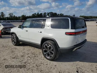 2023 Rivian R1S Adventure with VIN 7PDSGBBA3PN017791, listed as a Copart auction lot 82397374 with 20,733 mi miles and Salvage Title. Bid and sale history available at carsss.com. Image 2.