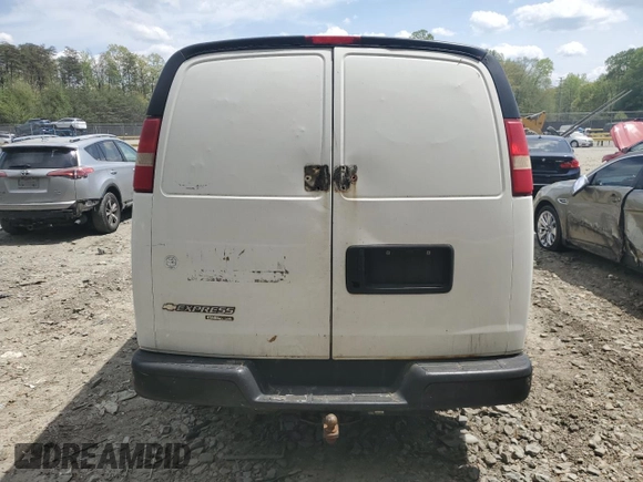 2013 Chevrolet Express Cargo with VIN 1GCWGFBA4D1110306, listed as a Copart auction lot 54005335 with 300,748 mi miles and Salvage title. Bid and sale history available at DreamBid. Image 6.