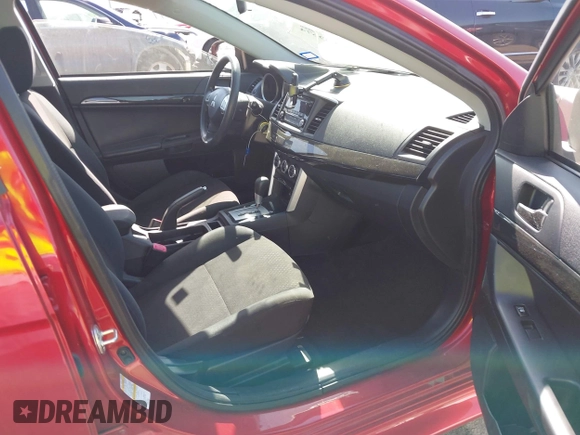 2016 Mitsubishi Lancer ES z VIN JA32U2FU3GU001857, wystawiony jako IAAI lot #41999674 z przebiegiem 65 520 mil mil oraz . Historia ofert i sprzedaży dostępna na DreamBid. Obrazek 5.