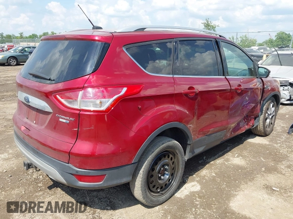 2015 Ford Escape Titanium z VIN 1FMCU9J91FUC58933, wystawiony jako IAAI lot #42583736 z przebiegiem 147 359 mil mil oraz . Historia ofert i sprzedaży dostępna na DreamBid. Obrazek 4.