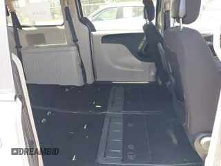 2013 Dodge Grand Caravan SE with VIN 2C4RDGBG0DR702913, listed as a IAAI auction lot 42007786 with 163,981 mi miles and . Bid and sale history available at DreamBid. Image 8.