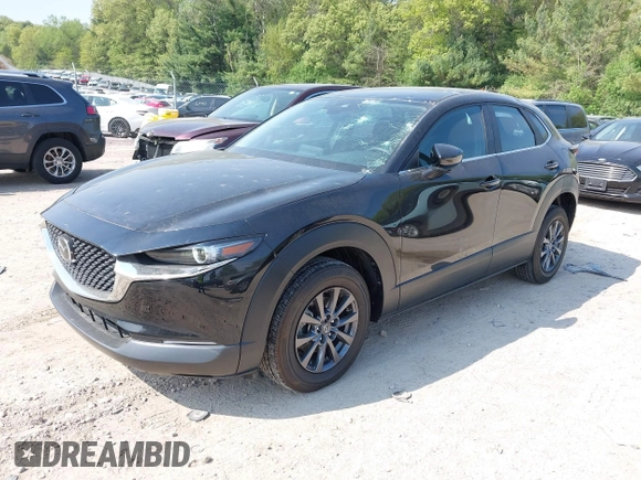 2021 Mazda CX-30 S with VIN 3MVDMBAL6MM264948, listed as a IAAI auction lot 42263077 with 13,614 mi miles and . Bid and sale history available at DreamBid. Image 2.