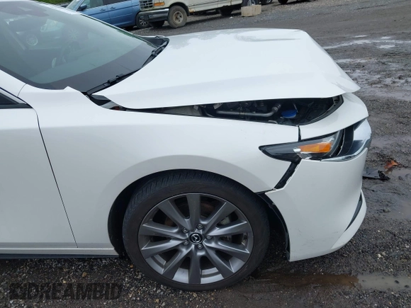 2021 Mazda 3 Preferred z VIN 3MZBPBCL0MM250862, wystawiony jako IAAI lot #42318612 z przebiegiem 86 056 mil mil oraz . Historia ofert i sprzedaży dostępna na DreamBid. Obrazek 19.