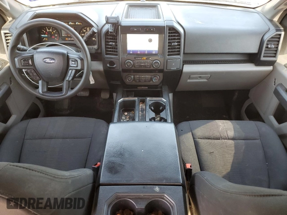 2020 Ford F-150 XL with VIN 1FTEW1CP6LKE24018, listed as a Copart auction lot 55812115 with 109,741 mi miles and Salvage title. Bid and sale history available at DreamBid. Image 8.