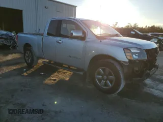 2010 Nissan Titan SE with VIN 1N6BA0CH6AN313367, listed as a Copart auction lot 83491054 with 161,918 mi miles and Salvage Title. Bid and sale history available at carsss.com. Image 4.
