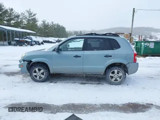 2006 Hyundai Tucson GL with VIN KM8JM72B06U298904, listed as a IAAI auction lot 41370728 with 209,284 mi miles. Bid and sale history available at carsss.com. Image 14.