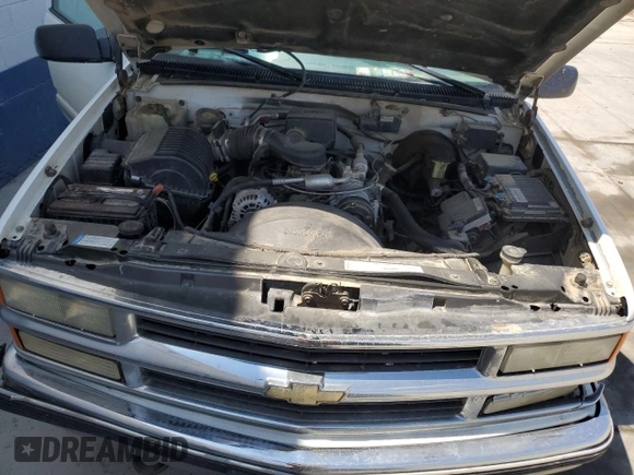 1999 Chevrolet Suburban with VIN 3GNFK16R4XG190883, listed as a Copart auction lot 58324415 with 228,782 mi miles and Salvage title. Bid and sale history available at DreamBid. Image 11.