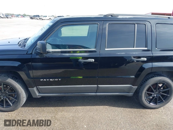 2013 Jeep Patriot Sport with VIN 1C4NJPBA0DD238009, listed as a IAAI auction lot 42301422 with 103,359 mi miles and . Bid and sale history available at DreamBid. Image 15.