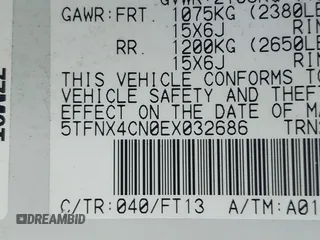 2014 Toyota Tacoma with VIN 5TFNX4CN0EX032686, listed as a IAAI auction lot 41435281 with 84,425 mi miles and . Bid and sale history available at DreamBid. Image 9.