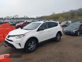 2018 Toyota RAV4 LE with VIN JTMBFREV8JJ722277, listed as a IAAI auction lot 42075684 with 203,458 mi miles and . Bid and sale history available at DreamBid. Image 2.