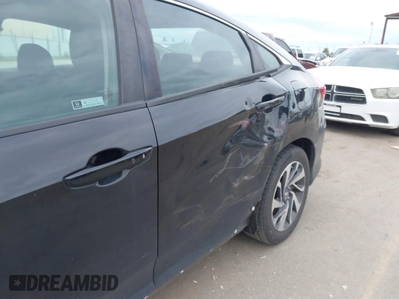 2018 Honda Civic EX with VIN 2HGFC2F75JH583892, listed as a IAAI auction lot 41697605 with 134,675 mi miles and . Bid and sale history available at DreamBid. Image 20.