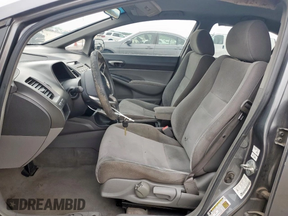 2010 Honda Civic LX with VIN 2HGFA1F52AH315977, listed as a Copart auction lot 54240115 with 217,883 mi miles and Salvage Title. Bid and sale history available at DreamBid. Image 7.