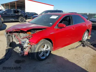 2014 Toyota Camry Hybrid LE with VIN 4T1BD1FKXEU138765, listed as a IAAI auction lot 41761389 with 228,111 mi miles. Bid and sale history available at carsss.com. Image 2.