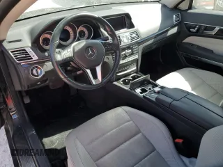 2015 Mercedes-Benz E 400 with VIN WDDKK6FFXFF301128, listed as a Copart auction lot 76691954 with 49,313 mi miles and Salvage title. Bid and sale history available at DreamBid. Image 8.