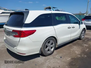 2018 Honda Odyssey EX-L z VIN 5FNRL6H70JB102713, wystawiony jako IAAI lot #42003129 z przebiegiem 410 500 mil mil oraz . Historia ofert i sprzedaży dostępna na DreamBid. Obrazek 4.