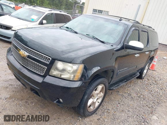 2007 Chevrolet Suburban LT with VIN 3GNFC16J87G228803, listed as a IAAI auction lot 41910240 with 303,191 mi miles and . Bid and sale history available at DreamBid. Image 2.