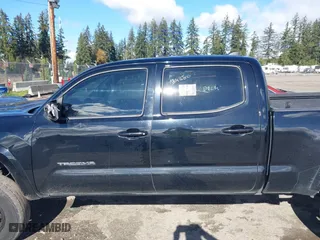 2016 Toyota Tacoma SR5 with VIN 5TFDZ5BN7GX001869, listed as a IAAI auction lot 40610002 with 184,380 mi miles. Bid and sale history available at carsss.com. Image 14.