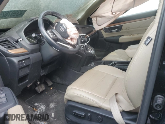 2017 Honda CR-V Touring with VIN 2HKRW2H91HH608340, listed as a Copart auction lot 43997625 with 58,446 mi miles and Salvage Title. Bid and sale history available at DreamBid. Image 7.