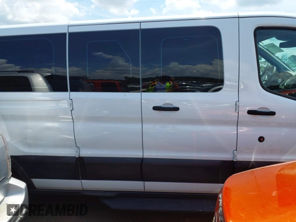 2019 Ford Transit Passenger XL with VIN 1FBZX2ZM8KKA53769, listed as a IAAI auction lot 42005385 with 62,118 mi miles and . Bid and sale history available at DreamBid. Image 13.
