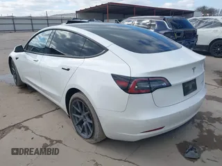 2021 Tesla Model 3 Long Range with VIN 5YJ3E1EB9MF059554, listed as a IAAI auction lot 41231520 with 63,696 mi miles and . Bid and sale history available at DreamBid. Image 3.
