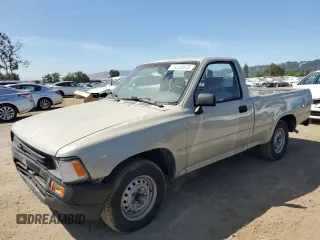1992 Toyota Pickup z VIN JT4RN81A1N0094217, wystawiony jako Copart lot #56062545 z przebiegiem 242 256 mil mil oraz Szkoda całkowita • Salvage title. Historia ofert i sprzedaży dostępna na DreamBid. Obrazek 1.