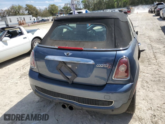 2010 MINI Convertible S z VIN WMWMS3C55ATY09138, wystawiony jako Copart lot #49045585 z przebiegiem 74 728 mil mil oraz Szkoda całkowita • Salvage title. Historia ofert i sprzedaży dostępna na DreamBid. Obrazek 6.