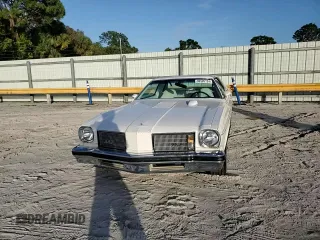 1975 Oldsmobile Cutlass z VIN 3J57T5M323248, wystawiony jako Copart lot #80526124 z przebiegiem 13 934 mil mil oraz Szkody całkowita. Historia ofert i sprzedaży dostępna na DreamBid. Obrazek 11.