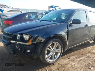 2012 Dodge Avenger SXT with VIN 1C3CDZCB2CN228306, listed as a IAAI auction lot 41833238 with 140,065 mi miles and . Bid and sale history available at carsss.com. Image 6.