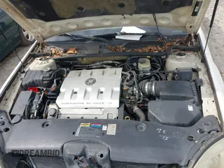 2000 Cadillac DeVille z VIN 1G6KD54Y2YU319515, wystawiony jako IAAI lot #41638065 z przebiegiem Nie podano mil oraz . Historia ofert i sprzedaży dostępna na DreamBid. Obrazek 10.