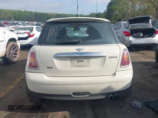 2007 MINI Hardtop with VIN WMWMF33587TT52466, listed as a IAAI auction lot 41964371 with 129,842 mi miles and . Bid and sale history available at DreamBid. Image 16.