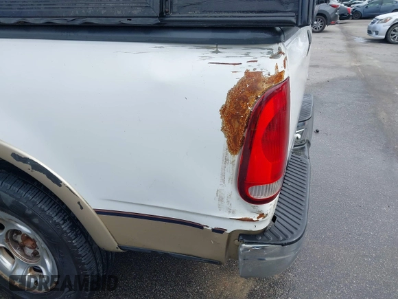 1999 Ford F-150 XL with VIN 1FTRX18LXXNA16159, listed as a IAAI auction lot 41746440 with 999,999 mi miles. Bid and sale history available at carsss.com. Image 6.