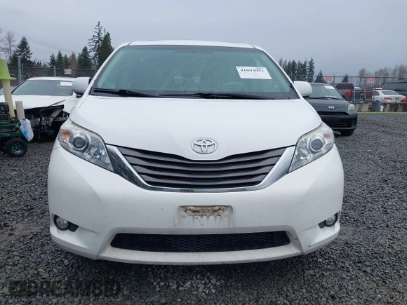 2014 Toyota Sienna XLE with VIN 5TDYK3DC2ES485846, listed as a IAAI auction lot 41693092 with 106,156 mi miles and . Bid and sale history available at DreamBid. Image 13.