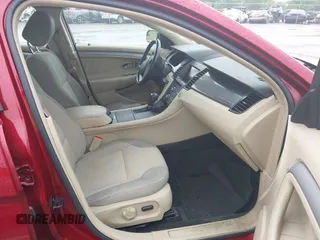 2014 Ford Taurus SEL z VIN 1FAHP2E83EG125622, wystawiony jako IAAI lot #42204238 z przebiegiem 134 032 mil mil oraz . Historia ofert i sprzedaży dostępna na DreamBid. Obrazek 5.