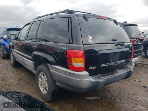 2000 Jeep Grand Cherokee Laredo with VIN 1J4GW48S7YC100739, listed as a Copart auction lot 89072965 with 150,333 mi miles and Salvage title. Bid and sale history available at DreamBid. Image 2.