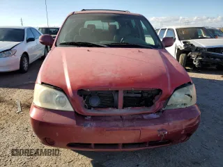 2005 Kia Sedona LX with VIN KNDUP132156669009, listed as a Copart auction lot 76936094 with 124,989 mi miles and Salvage Title. Bid and sale history available at carsss.com. Image 5.