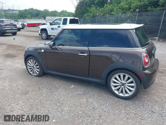 2010 MINI Hardtop with VIN WMWMF3C55ATZ23127, listed as a IAAI auction lot 42667783 with 61,954 mi miles and . Bid and sale history available at DreamBid. Image 3.