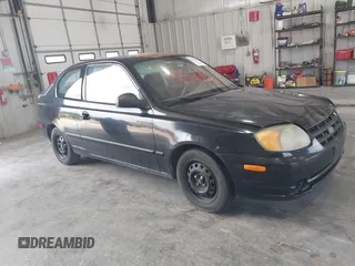 2003 Hyundai Accent z VIN KMHCF35CX3U260852, wystawiony jako IAAI lot #42329029 z przebiegiem 119 868 mil mil oraz . Historia ofert i sprzedaży dostępna na DreamBid. Obrazek 1.