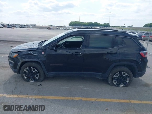 2017 Jeep Compass Trailhawk z VIN 3C4NJDDB6HT631047, wystawiony jako IAAI lot #42457508 z przebiegiem 59 414 mil mil oraz . Historia ofert i sprzedaży dostępna na DreamBid. Obrazek 14.