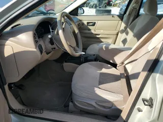 2005 Ford Taurus SE with VIN 1FAFP53U95A101336, listed as a Copart auction lot 56457095 with 127,656 mi miles and Salvage title. Bid and sale history available at DreamBid. Image 7.
