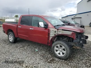 2005 Nissan Titan LE z VIN 1N6AA07B85N556721, wystawiony jako Copart lot #56566275 z przebiegiem 161 847 mil mil oraz Szkoda całkowita • Salvage title. Historia ofert i sprzedaży dostępna na DreamBid. Obrazek 4.