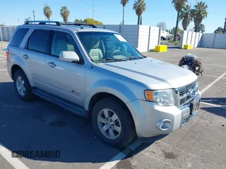 2009 Ford Escape Hybrid with VIN 1FMCU59349KA94375, listed as a IAAI auction lot 41865743 with 127,538 mi miles and . Bid and sale history available at DreamBid. Image 1.