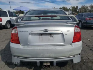 2006 Kia Spectra EX with VIN KNAFE122765228554, listed as a Copart auction lot 78458004 with 154,085 mi miles and Clean Title. Bid and sale history available at carsss.com. Image 6.