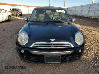 2007 MINI Convertible with VIN WMWRF33597TG16707, listed as a Copart auction lot 79104014 with 113,380 mi miles and Salvage Title. Bid and sale history available at DreamBid. Image 5.
